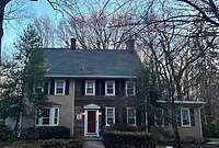 Historic Home Roof Repair with Custom Flashing Around Chimneys