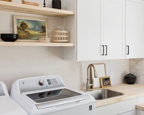 laundry room remodel south jersey with custom cabinets, shelving and wallpaper