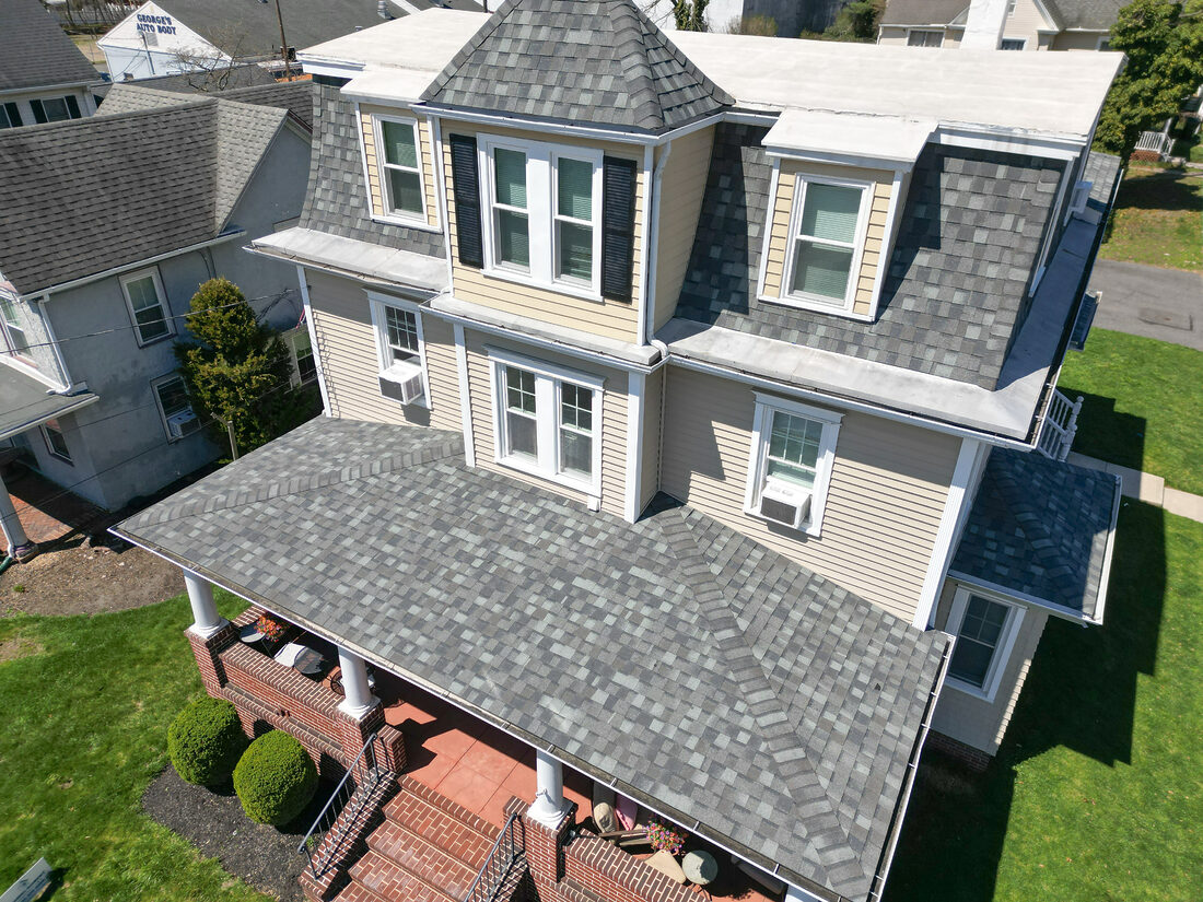 drone photo of a roof replacement in pitman nj done but daniel robert remodeling. shingles are certain teed georgetown gray
